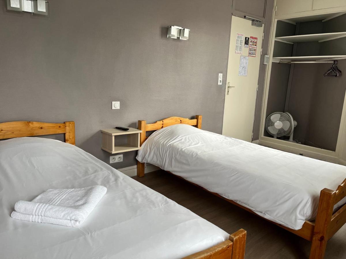 Aux Bons Amis Hotel Reims Bagian luar foto